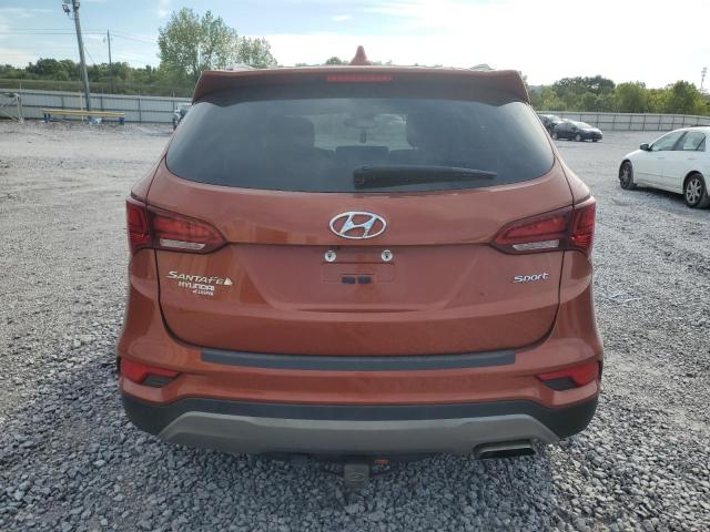 5XYZU3LB2JG522036 - 2018 HYUNDAI SANTA FE S ORANGE photo 6