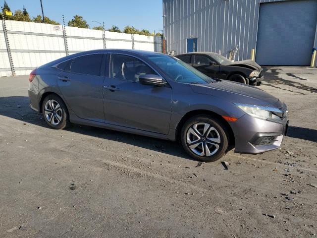 2HGFC2F52JH520554 - 2018 HONDA CIVIC LX 灰色 照片 4