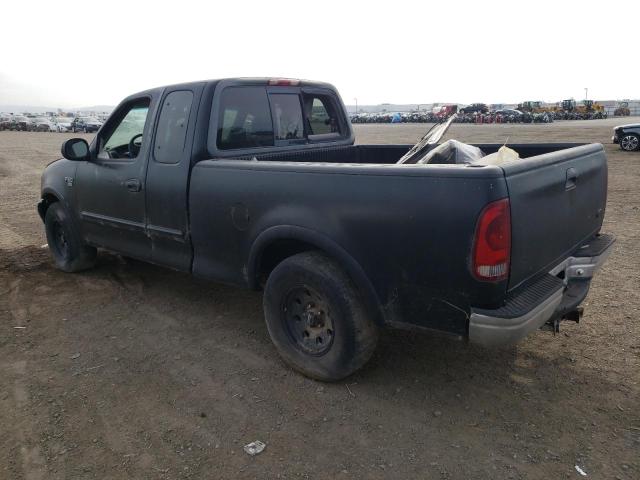 1FTRX17L8XNC29404 - 1999 FORD F150 BLACK photo 2