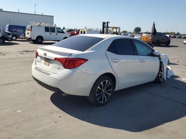 5YFBURHE9JP796076 - 2018 TOYOTA COROLLA L WHITE photo 3