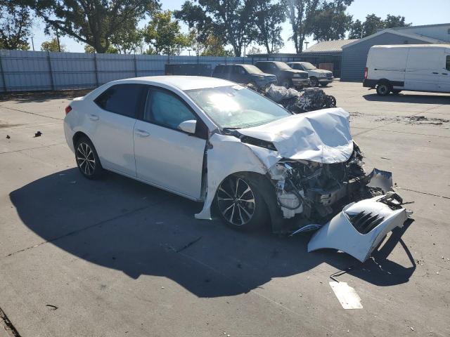 5YFBURHE9JP796076 - 2018 TOYOTA COROLLA L WHITE photo 4