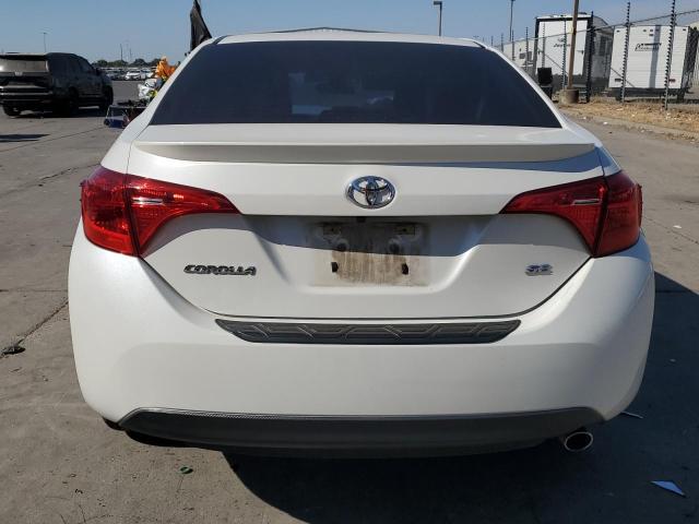 5YFBURHE9JP796076 - 2018 TOYOTA COROLLA L WHITE photo 6