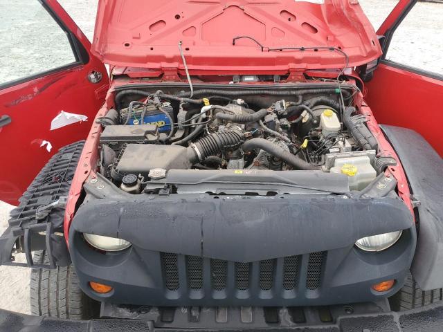 1J4AA2D10AL100299 - 2010 JEEP WRANGLER SPORT RED photo 11