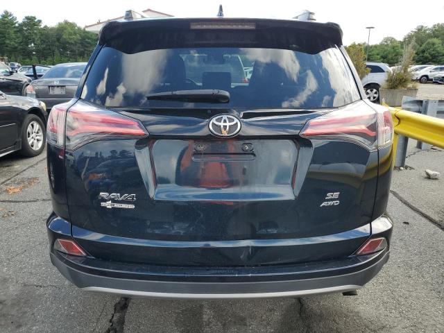 JTMJFREV6JJ179328 - 2018 TOYOTA RAV4 SE BLACK photo 6