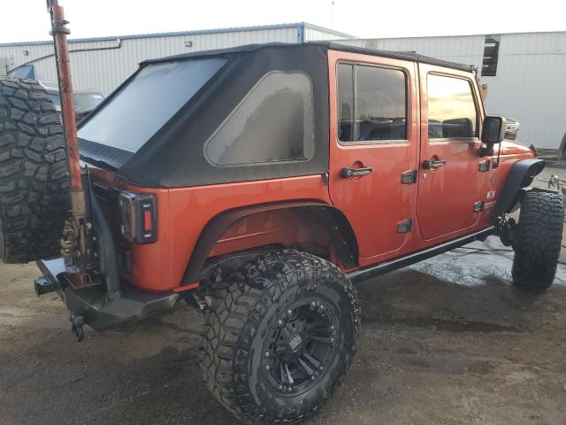 1J4GA391X9L764534 - 2009 JEEP WRANGLER U X ORANGE photo 3