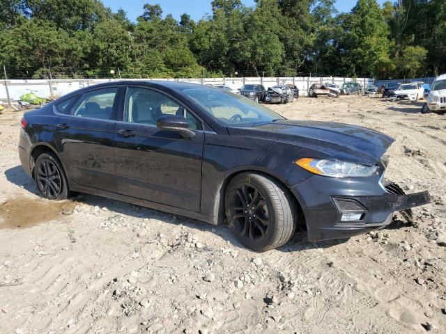 3FA6P0HD5LR257341 - 2020 FORD FUSION SE BLACK photo 4