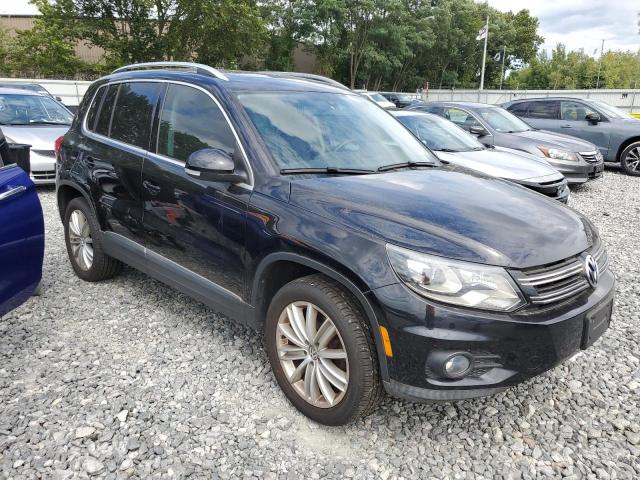 WVGAV7AX5GW588460 - 2016 VOLKSWAGEN TIGUAN S BLACK photo 4