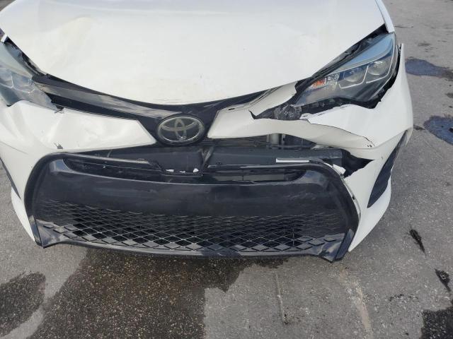 5YFBURHEXKP939621 - 2019 TOYOTA COROLLA L 白色 照片 9