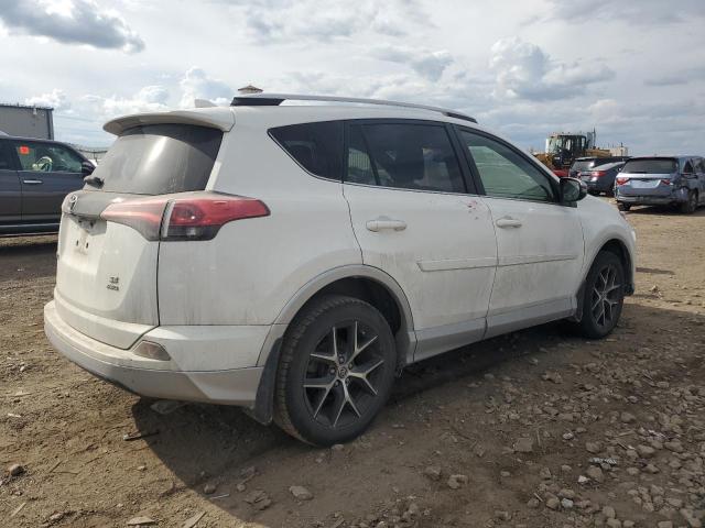 JTMJFREV6GJ070960 - 2016 TOYOTA RAV4 SE WHITE photo 3