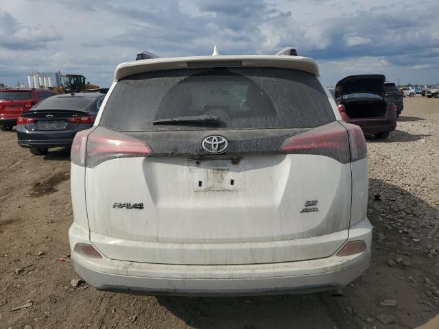 JTMJFREV6GJ070960 - 2016 TOYOTA RAV4 SE WHITE photo 6