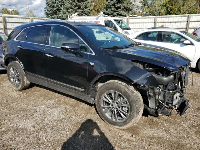 1GYKNDRS4MZ194095 - 2021 CADILLAC XT5 PREMIUM LUXURY BLACK photo 4