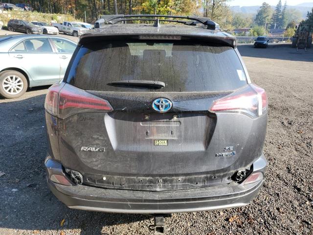 JTMJJREV6JD188723 - 2018 TOYOTA RAV4 HV SE BLACK photo 6