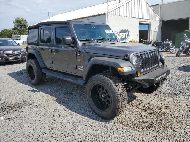 1C4HJXDG4JW213953 - 2018 JEEP WRANGLER U SPORT Серый фото 4