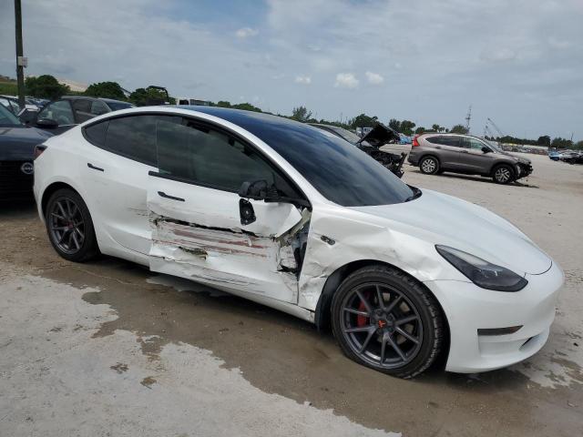 5YJ3E1EA9MF091525 - 2021 TESLA MODEL 3 WHITE photo 4