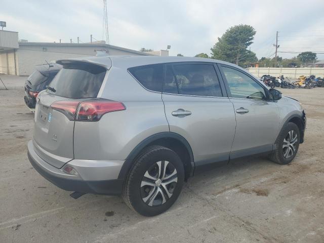 JTMBFREV4JJ215022 - 2018 TOYOTA RAV4 LE SILVER photo 3