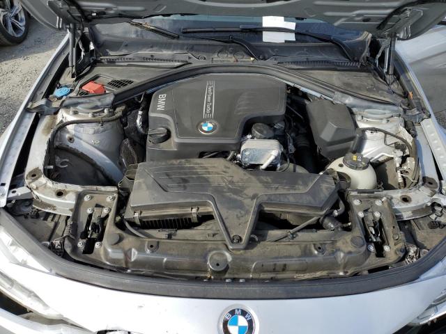 WBA8E1G55JNU89122 - 2018 BMW 320 I SILVER photo 11