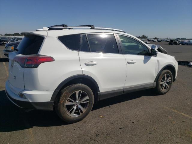 JTMRFREVXGJ090390 - 2016 TOYOTA RAV4 XLE WHITE photo 3