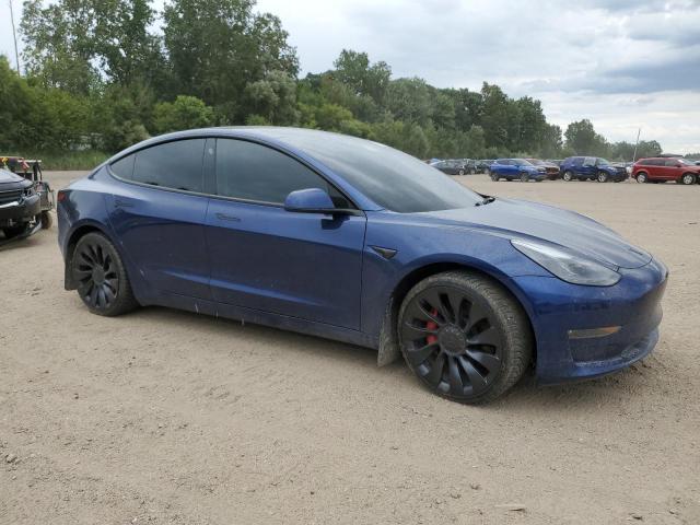 5YJ3E1ECXNF321737 - 2022 TESLA MODEL 3 Blau Foto 4