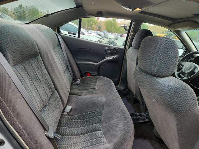 1G2NF52E72M567607 - 2002 PONTIAC GRAND AM SE1 فضي صورة 10