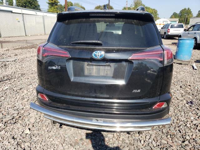 JTMRJREV5JD207037 - 2018 TOYOTA RAV4 HV LE BLACK photo 6