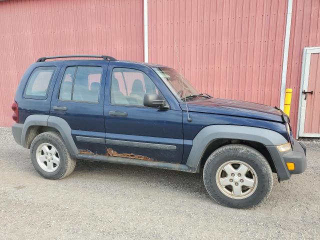 1J4GL48KX6W275796 - 2006 JEEP LIBERTY SPORT Blau Foto 4