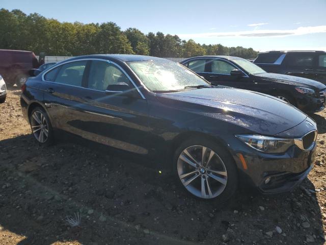WBA4J3C56KBL09712 - 2019 BMW 430XI GRAN COUPE BLACK photo 4