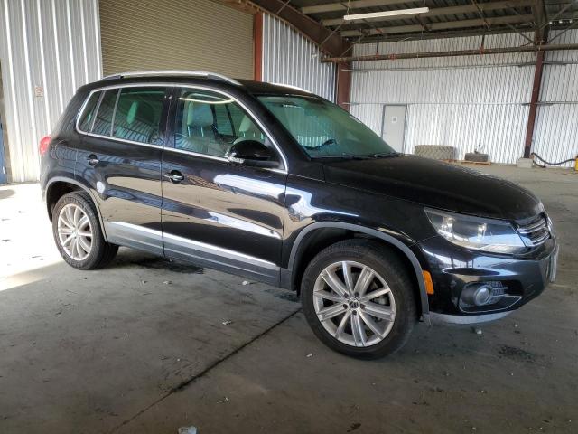 WVGAV7AXXCW583166 - 2012 VOLKSWAGEN TIGUAN S 黑色 照片 4