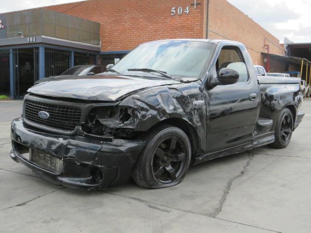 2FTRF073X4CA75485 - 2004 FORD F150 SVT LIGHTNING BLACK photo 2