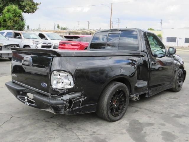 2FTRF073X4CA75485 - 2004 FORD F150 SVT LIGHTNING BLACK photo 3