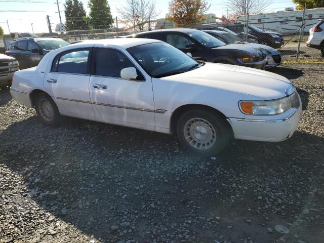1LNHM81W1XY654778 - 1999 LINCOLN TOWN CAR EXECUTIVE WHITE photo 4