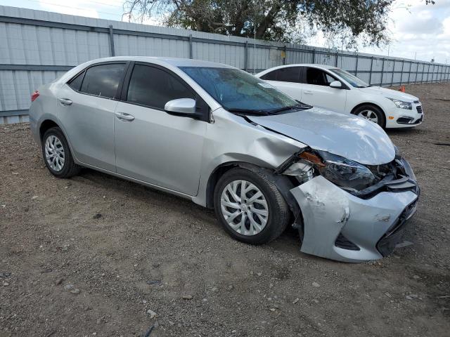 5YFBURHE0KP880837 - 2019 TOYOTA COROLLA L SILVER photo 4