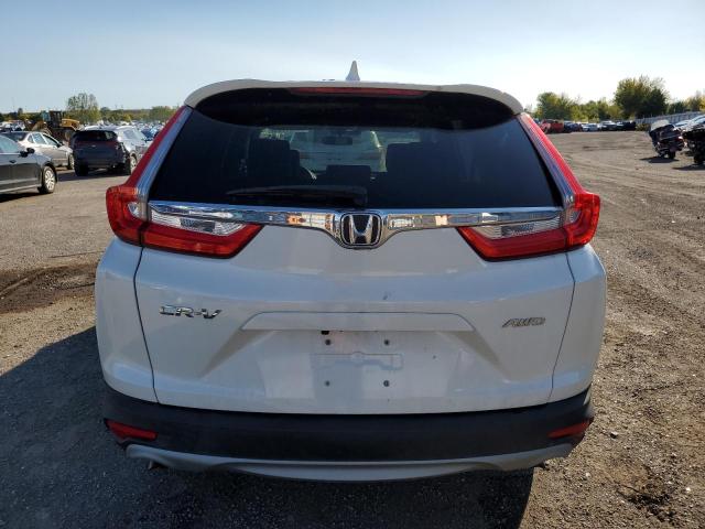 2HKRW2H20JH105682 - 2018 HONDA CR-V LX WHITE photo 6