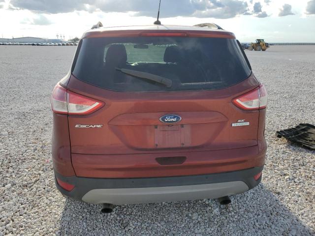 1FMCU0GXXFUA51801 - 2015 FORD ESCAPE SE RED photo 6