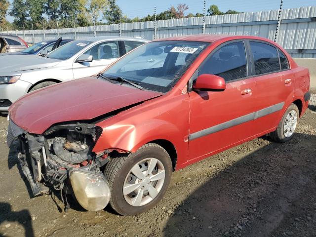 KNADE223296461018 - 2009 KIA RIO BASE ORANGE photo 1