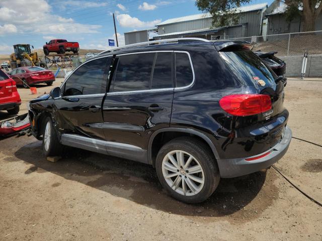 WVGAV7AX8CW586065 - 2012 VOLKSWAGEN TIGUAN S BLACK photo 2