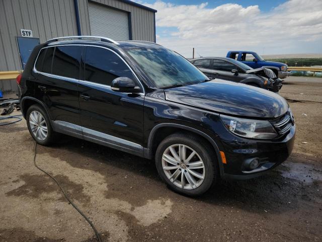 WVGAV7AX8CW586065 - 2012 VOLKSWAGEN TIGUAN S BLACK photo 4