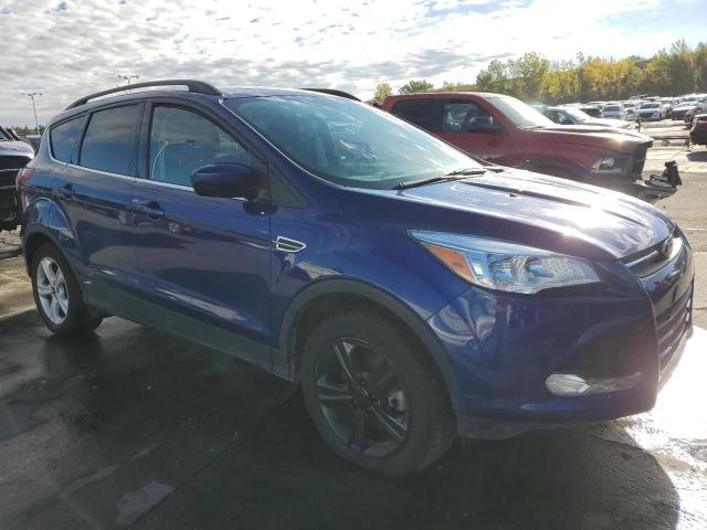 1FMCU9G90FUB26401 - 2015 FORD ESCAPE SE BLUE photo 4