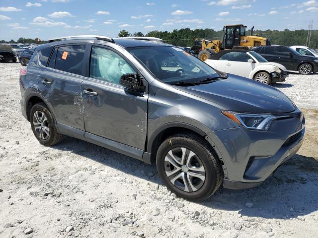 2T3ZFREV8JW460826 - 2018 TOYOTA RAV4 LE ნაცრისფერი ფოტო 4