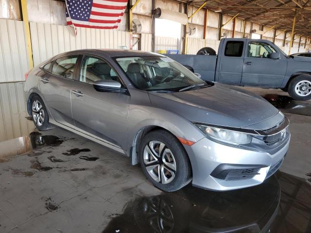19XFC2F56JE020066 - 2018 HONDA CIVIC LX SILVER photo 4