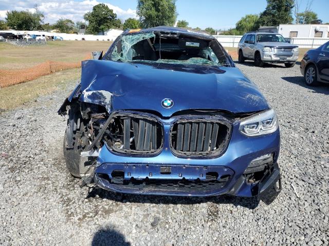 5UXUJ5C5XKLA93597 - 2019 BMW X4 M40I BLUE photo 5