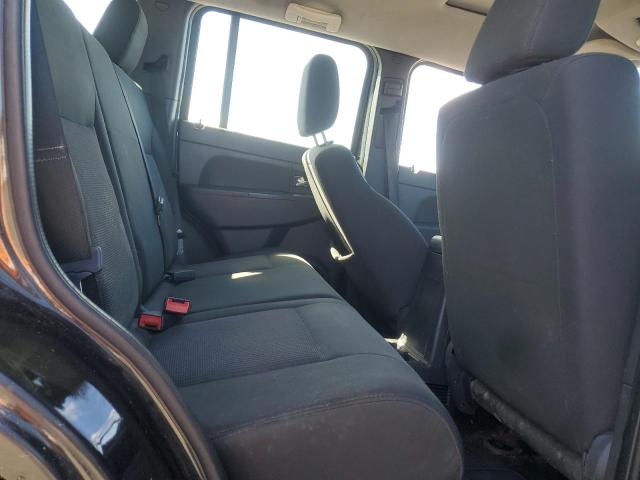 1J8GN28K19W544172 - 2009 JEEP LIBERTY SPORT BLACK photo 11