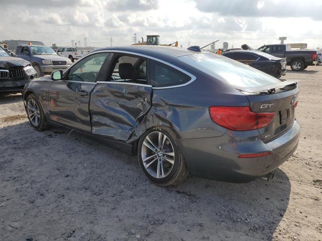 WBA8Z9C53JG828795 - 2018 BMW 330 XIGT GRAY photo 2