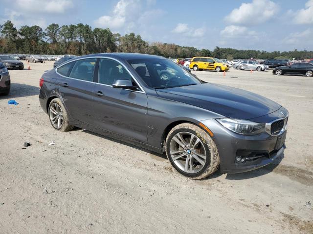 WBA8Z9C53JG828795 - 2018 BMW 330 XIGT GRAY photo 4