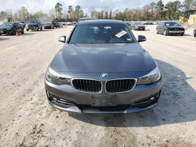 WBA8Z9C53JG828795 - 2018 BMW 330 XIGT GRAY photo 5