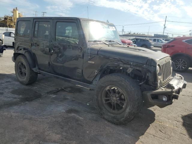 1C4BJWEG0GL288822 - 2016 JEEP WRANGLER U SAHARA BLACK photo 4