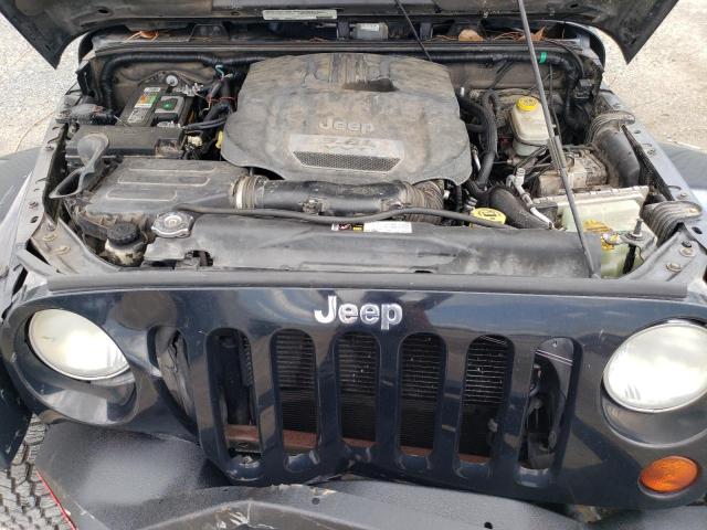 1C4BJWEG8CL279585 - 2012 JEEP WRANGLER U SAHARA BLACK photo 12