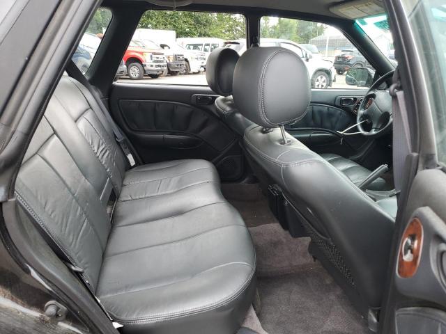4S3BG6856X7648743 - 1999 SUBARU LEGACY OUTBACK BLACK photo 10