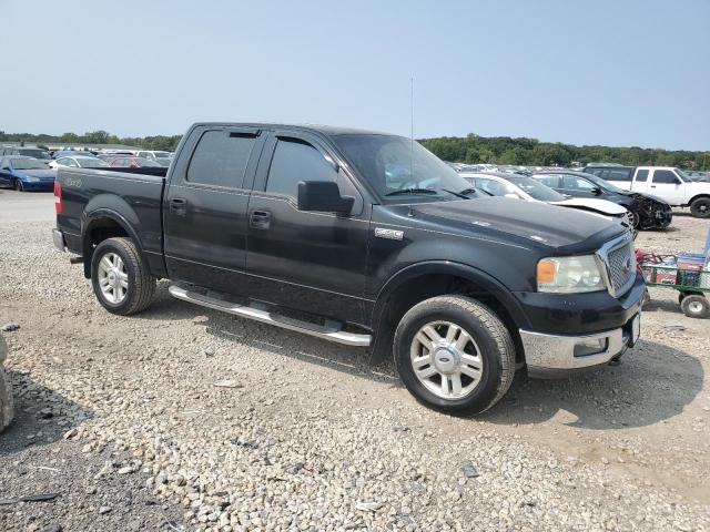 1FTPW14564FA37923 - 2004 FORD F150 SUPERCREW BLACK photo 4