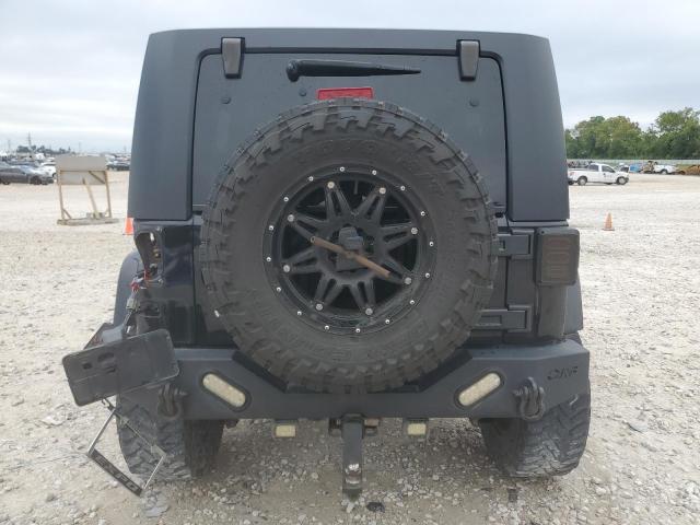 1J4HA5H10AL171030 - 2010 JEEP WRANGLER U SAHARA BLACK photo 6