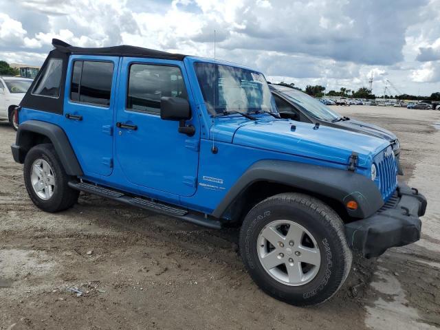 1J4BA3H13BL541379 - 2011 JEEP WRANGLER U SPORT Blau Foto 4